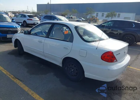 2003 Kia Spectra Ls z USA, uszkodzony, nr VIN KNAFB121435271289